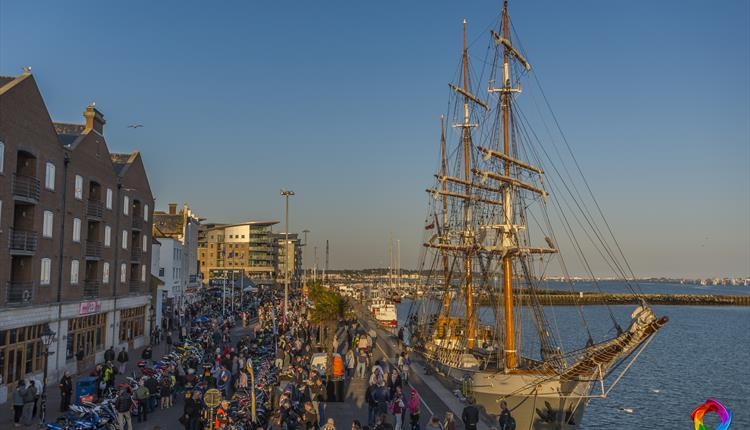 Crowds of people on the Quay enjoying Poole Dream Machines 